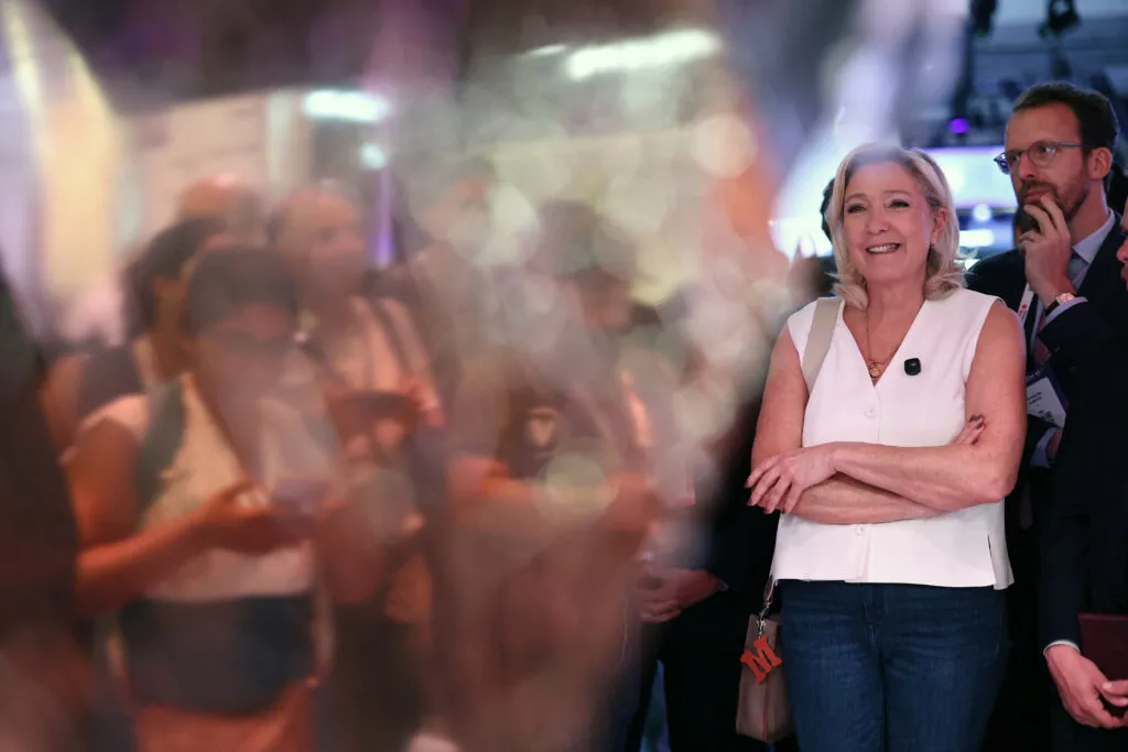 Le Pen greets supporters at VivaTech in Paris
